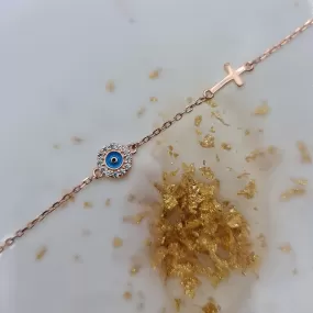 Dion blue evil eye and cross cz bracelet in rosegold